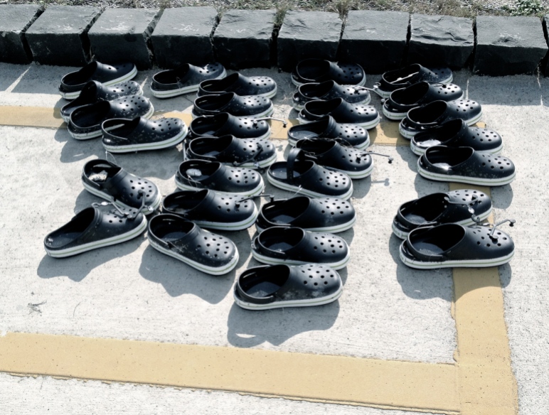 A collection of shoes in the carpark, yet there was not a soul on the beach?
